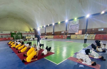 Embassy of India, Baghdad on 18th June 2022 conducted a Yoga Day Training program in collaboration with Ministry of Youth and Sports, Iraq in the run-up to International Day Yoga - 2022 that is to be celebrated on 21st June 2022. Embassy of India has been hosting yoga sessions, training, workshops, awareness, yoga campaigns and curtain raisers. Today was the 7th event in the series where more than 90 national-level trainers, coaches and players of Judo including Football and Tennis participated and practiced yogasanas in the training program